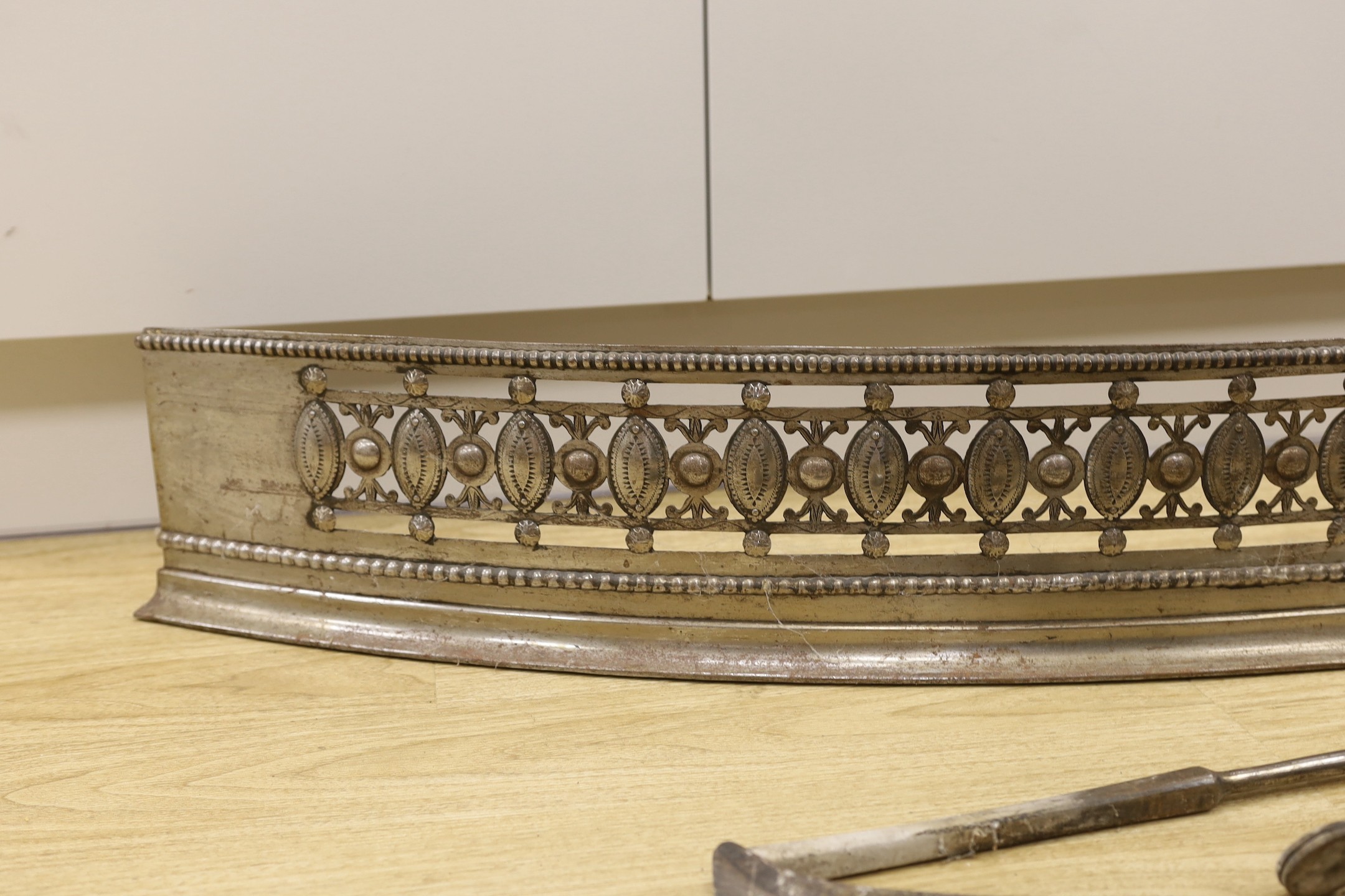 A suite of fireplace furniture comprising of a basket, fender and tools